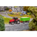MF Tractor with wood chips trailer (WIKING)